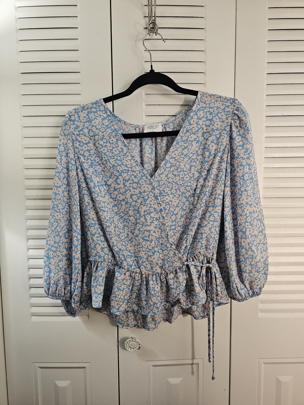Sienna Sky Light Blue Floral Wrap Blouse